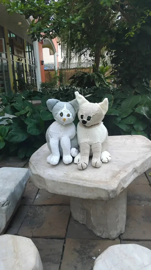 The Beauty of the Botched: My Newest Ugly Cat two knitted ugly cats