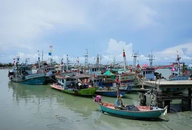 Laem Charoen Beach: a view of the fishing vessels as seen from the seafood restaurant