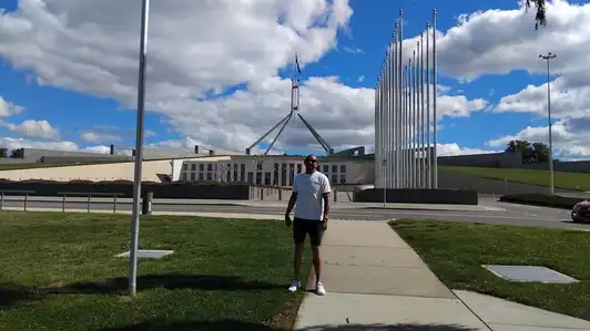 Pete outside parliament house in Canberra